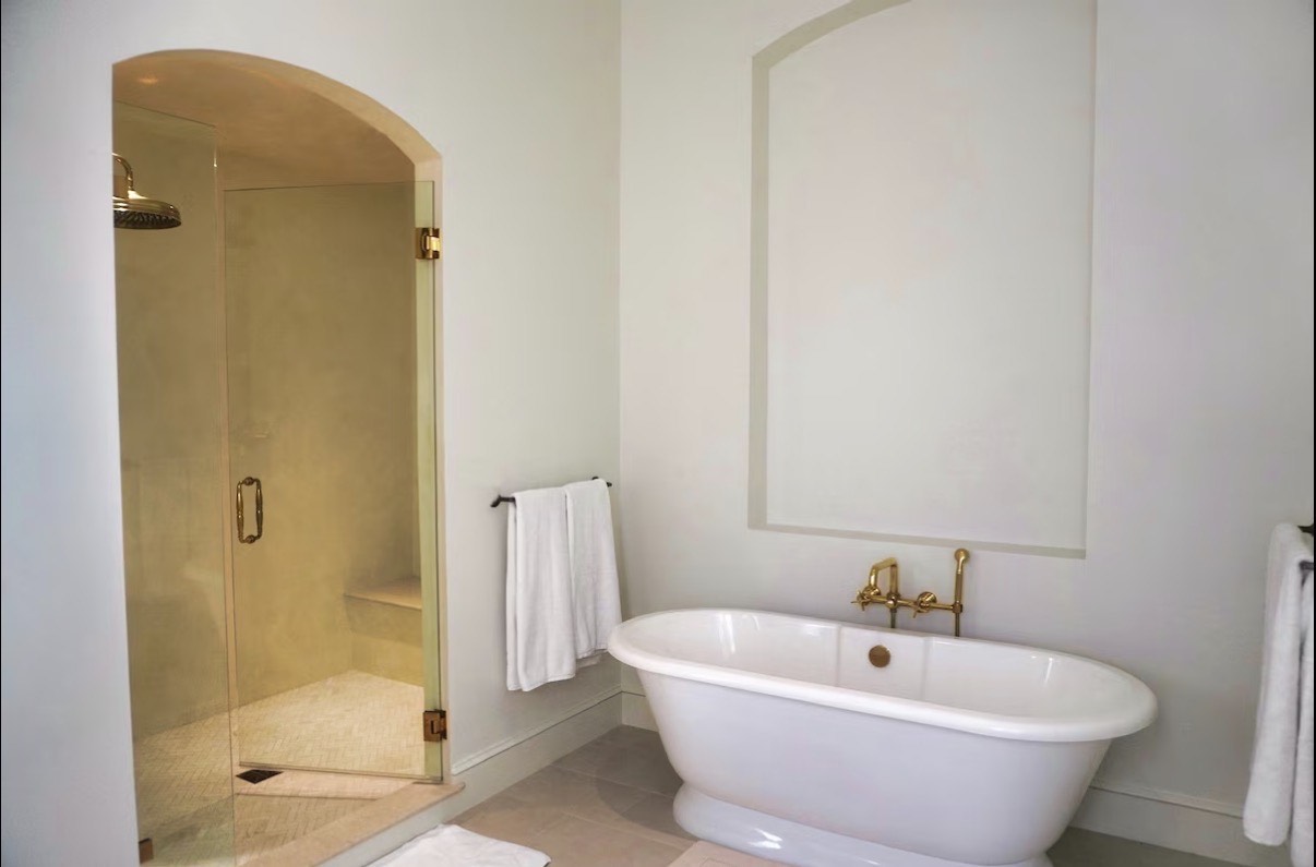 Bathroom with freestanding soaking tub